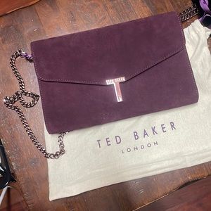 Only worn once,Ted Baker burgundy suede crossbody/clutch bag with dust bag!